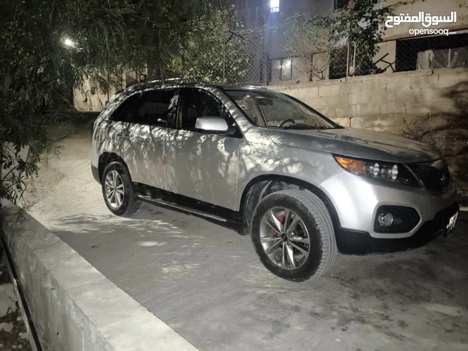 كيا سيرنتو4×4ديزل متور2200 فول اضافات فتحه بانوراما هوك مسجل بترخيص