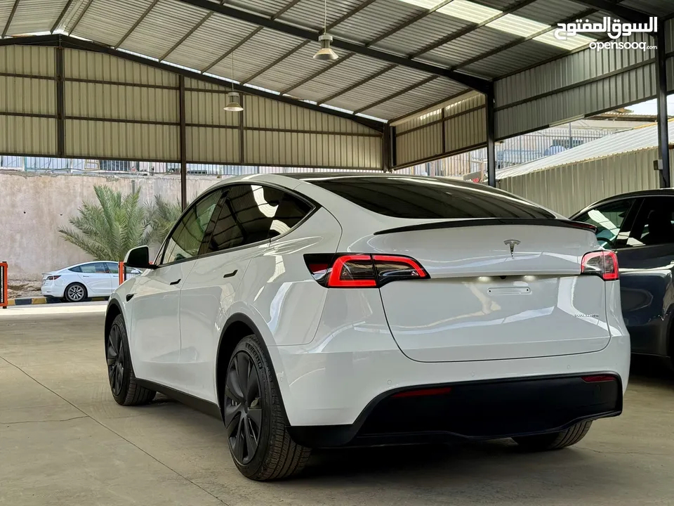 Tesla Model Y 2022 ( LONG RANGE DUAL MOTOR )  فحص الشريف  7 جيد  ، B+ اوتوسكور ايرباج مغلق غير مفتوح