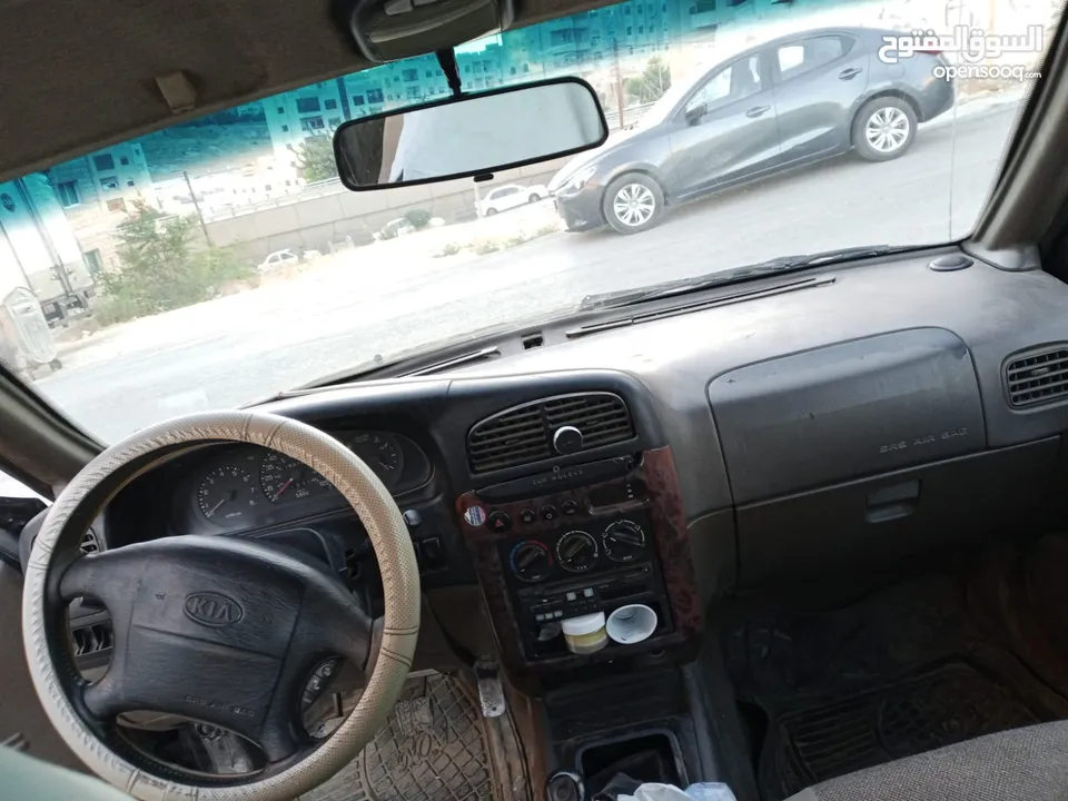 كيا سبورتج 2001 لون اسود للبيع