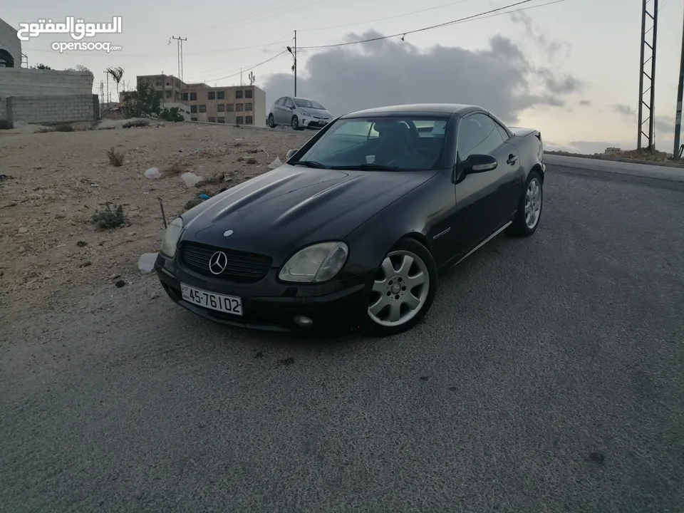 مرسيدس SLK 2003 لون أسود ملوكي، كشف، ترخيص جديد وارد غرغور مالك ثالث من الوكالة