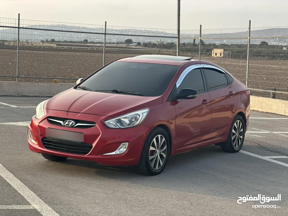 هونداي اكسنت /2014 فل فتحة سقف ديزل اتوماتيك 4 غيار كاملة الإضافات و المميزات