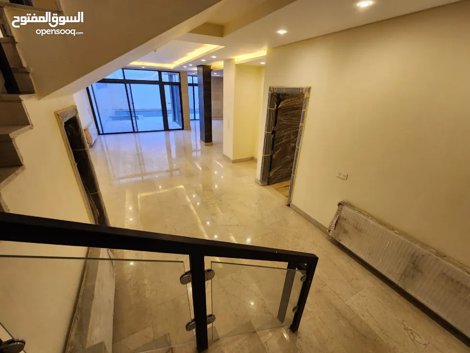 فيلا متلاصقة للبيع في عبدون - ref : 14510