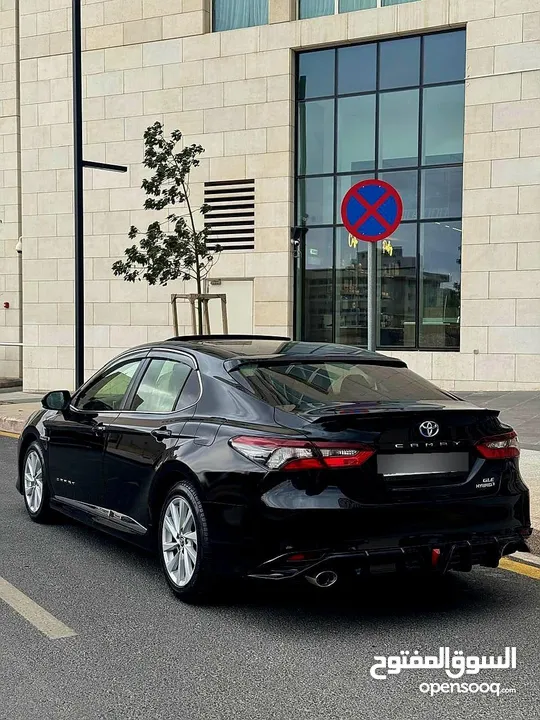 تويوتا كامري 2021 فل كامل مع فتحة فحص كامل 7 جيد كرت ابيض بحالة الشركة