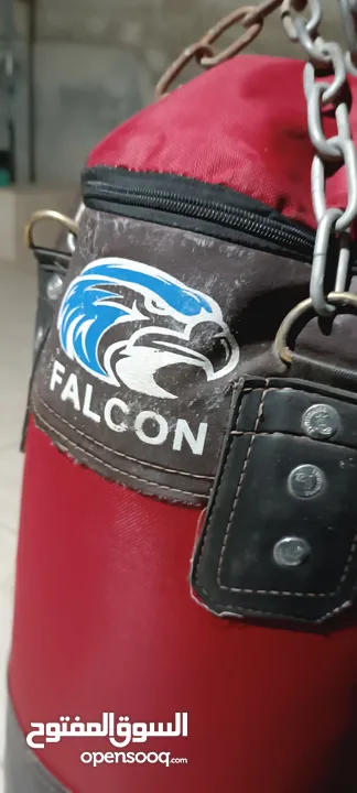 كيس ملاكمة falcon الأصلي تعليق  طول 100سم وزن 50كغم محشي قماش مبطن فلين مع جميع مستلزماته للبيع