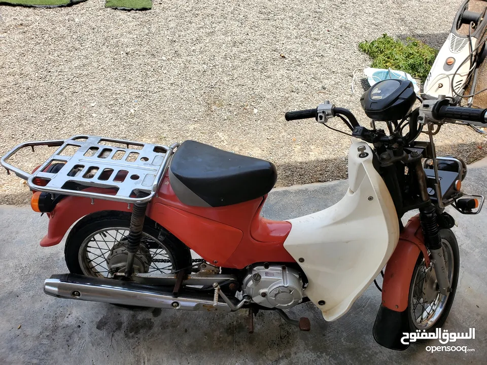 دراجه سبعين قوة المحرك 110 cc  احمر تشتغل سلف مع هندل بحالة جيده جدا جاهزة للاستخدام