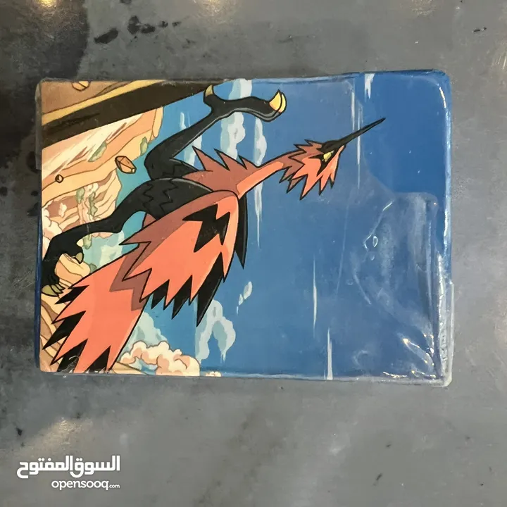 كروت بوكيمون والبومات (Pokemon cards and binders)