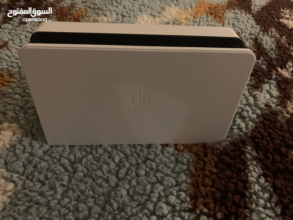 نينتيندو سويش oled مع العاب و جميع ملحقاتها  Nintendo switch oled with games and all accessories