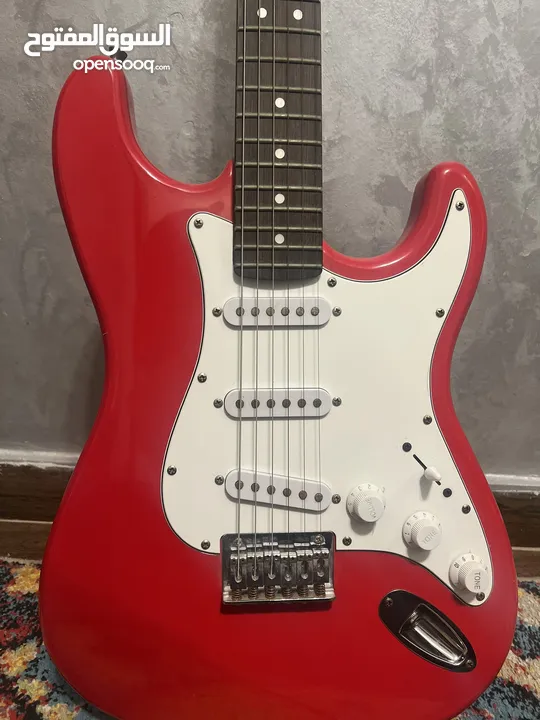 Red fender squier stratocaster