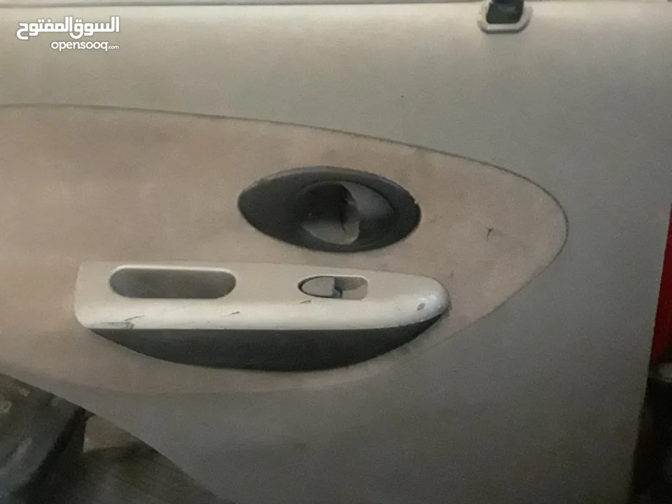 اربع ابواب وغطا امامي وغطا خلفي لشيري QQ 2006