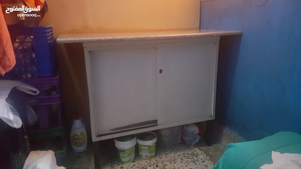 Metal cabinet with granite top going very cheap