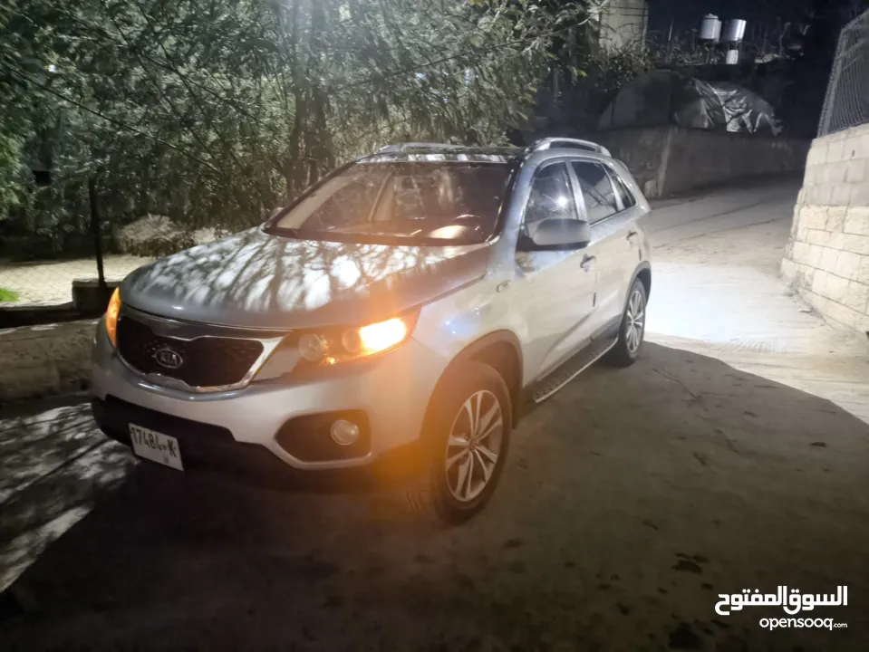 كيا سيرنتو4×4ديزل متور2200 فول اضافات فتحه بانوراما هوك مسجل بترخيص