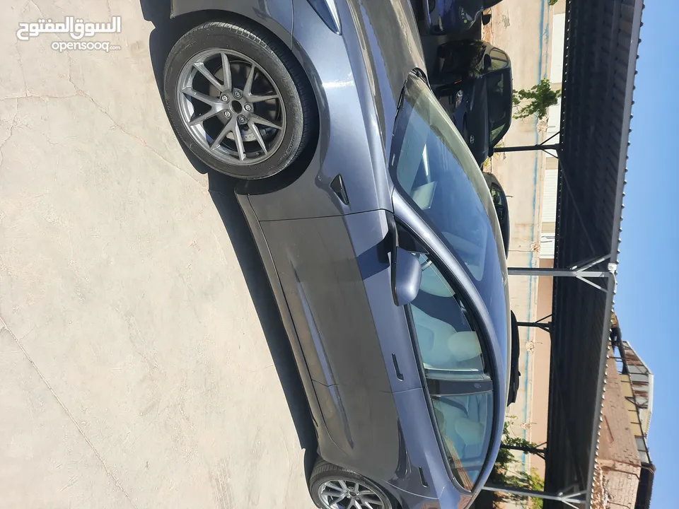 تيسلا موديل 3 موديل 2023 لون فيراني داخل ابيض عداد قليل بسعر مناسب