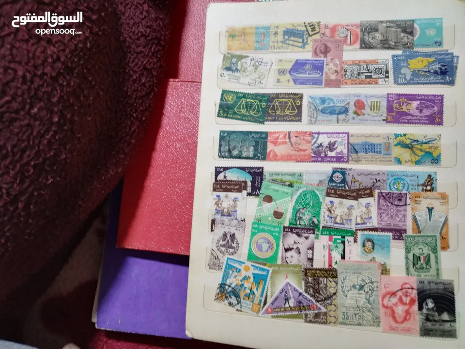 نيشان ملكى وزن41, 41 جرام من الدهب والفضه وعقدفضه من الاحجار الكريمه وطوابع قديمه نادره