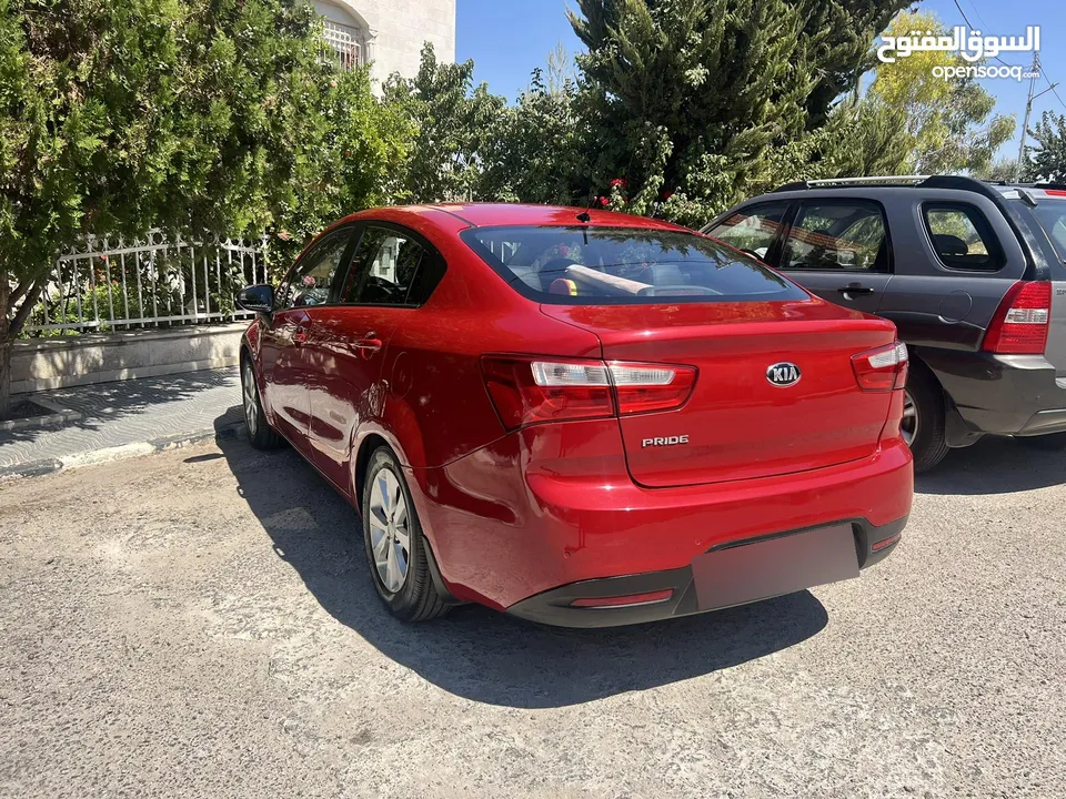 ماشيه 95000 فقطKia rio فل كامل عدا الفتحه