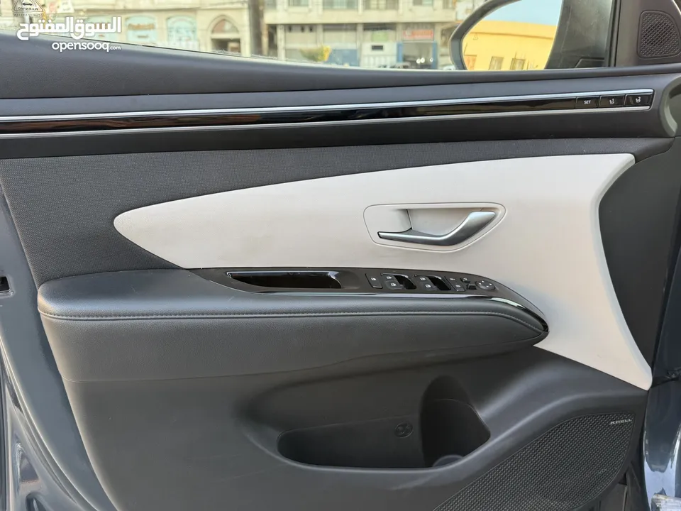 هونداي توسان ترخيص 2022 محرك 1600 هايبرد plug in/يقطع على الشحنه 65 كيلو متر  271 حصان