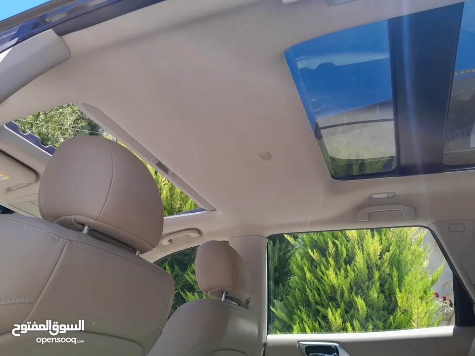 نيسان باثفندر 2015 فحص كرت ابيض وارد الشركة وصيانة الشركة مالك ثاني لون أخضر زيتي فرش جلد ابيض