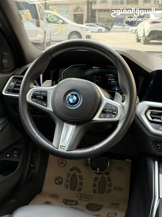 ترخيص 2022 BMW  330e  محرك 2000 هايبرد plug in/يقطع على الشحنه 50 كيلو متر  297 حصان
