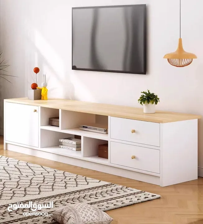 طاولة تلفزيون بلون أبيض وخشبي بتخطف الأنظار! المقاس 160*30*40 سم تصميم مودرن وعصري
