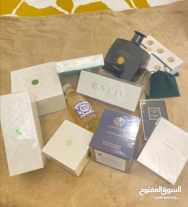 عطور أصلية أمواج وكوكو شانيل وصابون وشمعة وحلق دامس الأسعار إن شاء الله في متناول الجميع