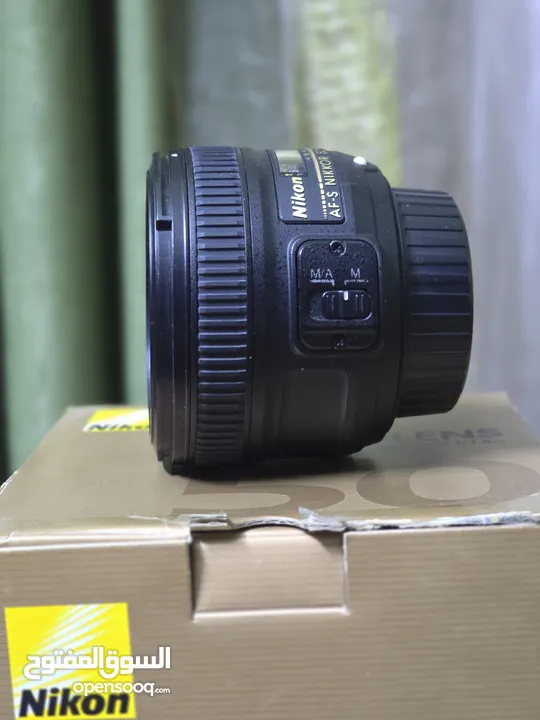 كاميرا نيكون NIKON D7100 مع عدسة 18-140 ملم للبيع  مع عدسة 50 ملم  للبيع بشكل منفصل "اقرأ بتمعن"