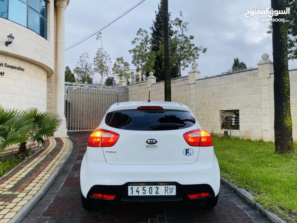 كيا برايد 2015 بحالة الوكالة فل اوتماتك ترخيص وتإمين جديد الله يبارك ..