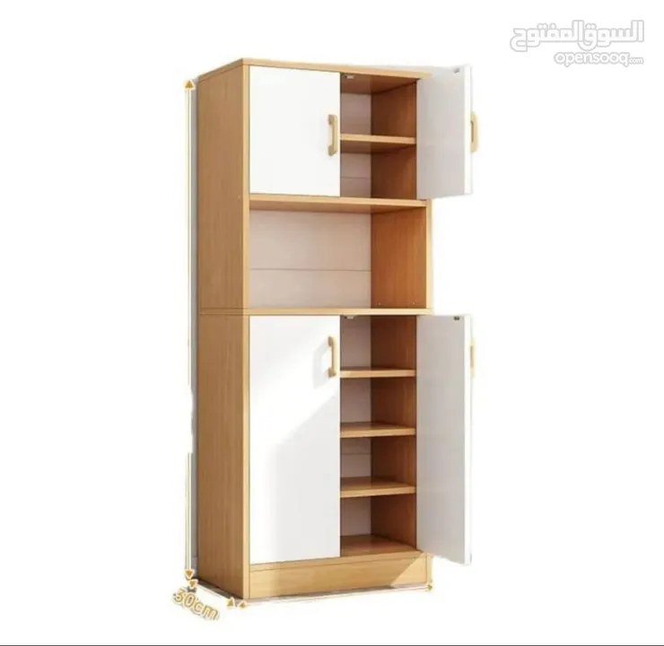 قدّمنا لك خزانة مطبخ خشب بـ 4 أبواب + رف وسطي بتصميم عملي وعصري الأبعاد: 150×30×60 سم