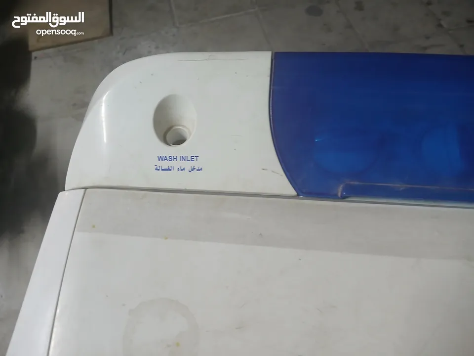 غسالة مع نشافه