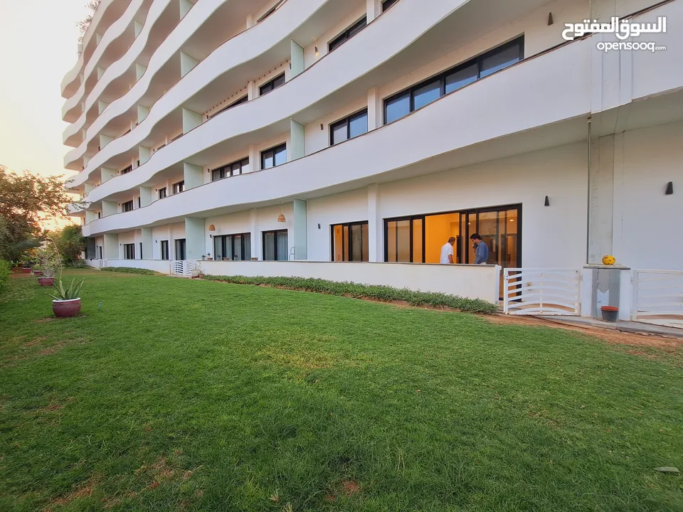 Modern 2BHK Luxury Apartment in Muscat Hills with Private Garden!