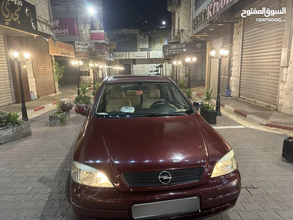 أوبل أسترا السياره مرتبه قبل ما تشتري افحص وين ما بدك السيارة متواضعة