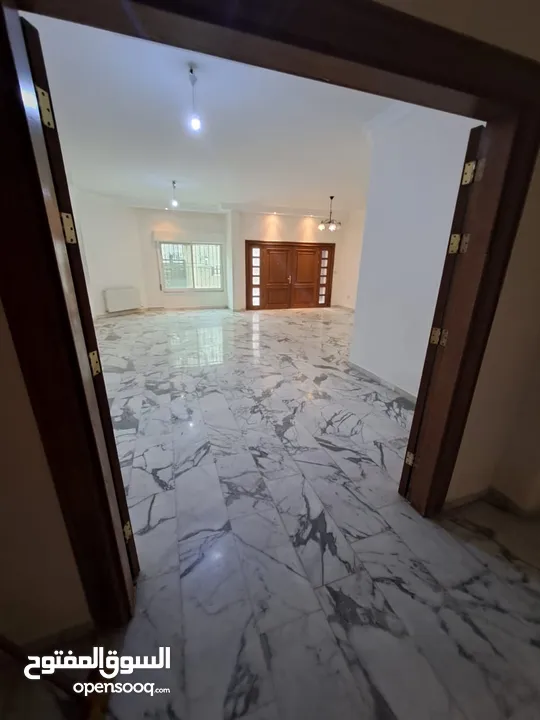 شقة ارضية في دير غبار للبيع - ref : 14405