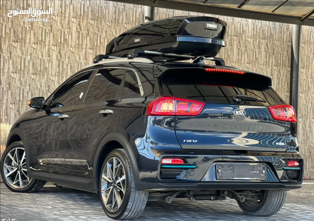 صندوق او بكس ظهر السيارة كيا نيرو وسيارات اخرى.               thule sweden roof box