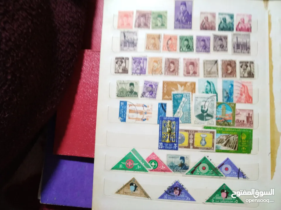 نيشان ملكى وزن41, 41 جرام من الدهب والفضه وعقدفضه من الاحجار الكريمه وطوابع قديمه نادره