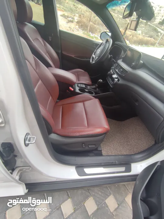 هونداي توسان فل الفل اضافات دهان شركة وعداد أصلي 70000كم فقططط رخصة وتأمين شامل للبيع بسعر مغري