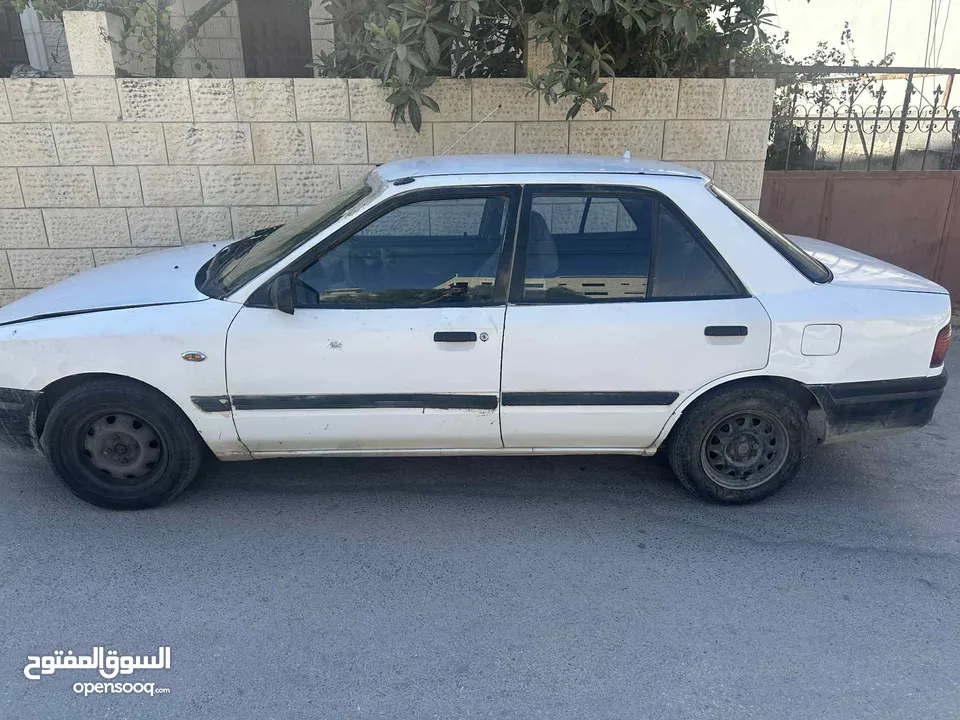 مازدا سوداني 323