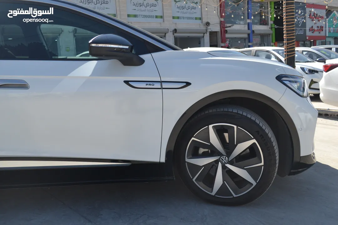 VOLKSWAGEN ID.4 CROZZ  PRO BIANO BLACK  2023 لون لؤلؤي فحص كامل