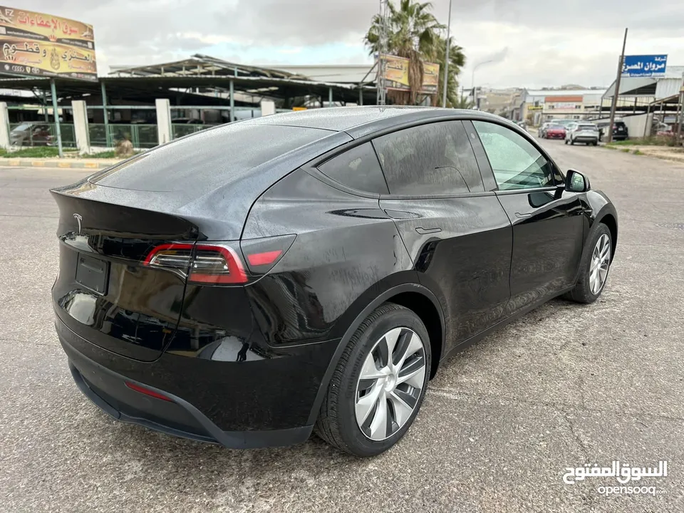 TESLA MODEL Y 2022 LONG-RANGE DUAL MOTOR-7 Seats  (سبع مقاعد)