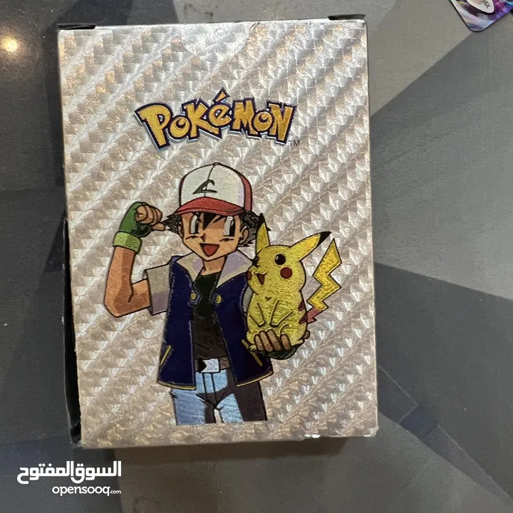 كروت بوكيمون والبومات (Pokemon cards and binders)