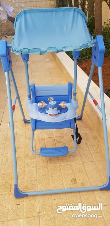 مرجيحة أطفال لون ازرق مستعمل بحال الجديد للبيع