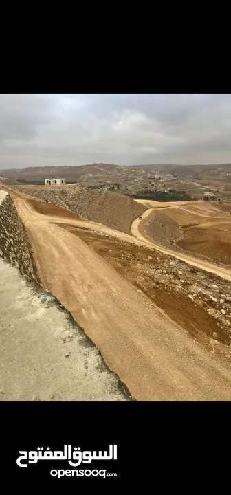قطع (طابو)  مطلة على شارع المية(ممر عمان التنموي) وادي العش من المالك