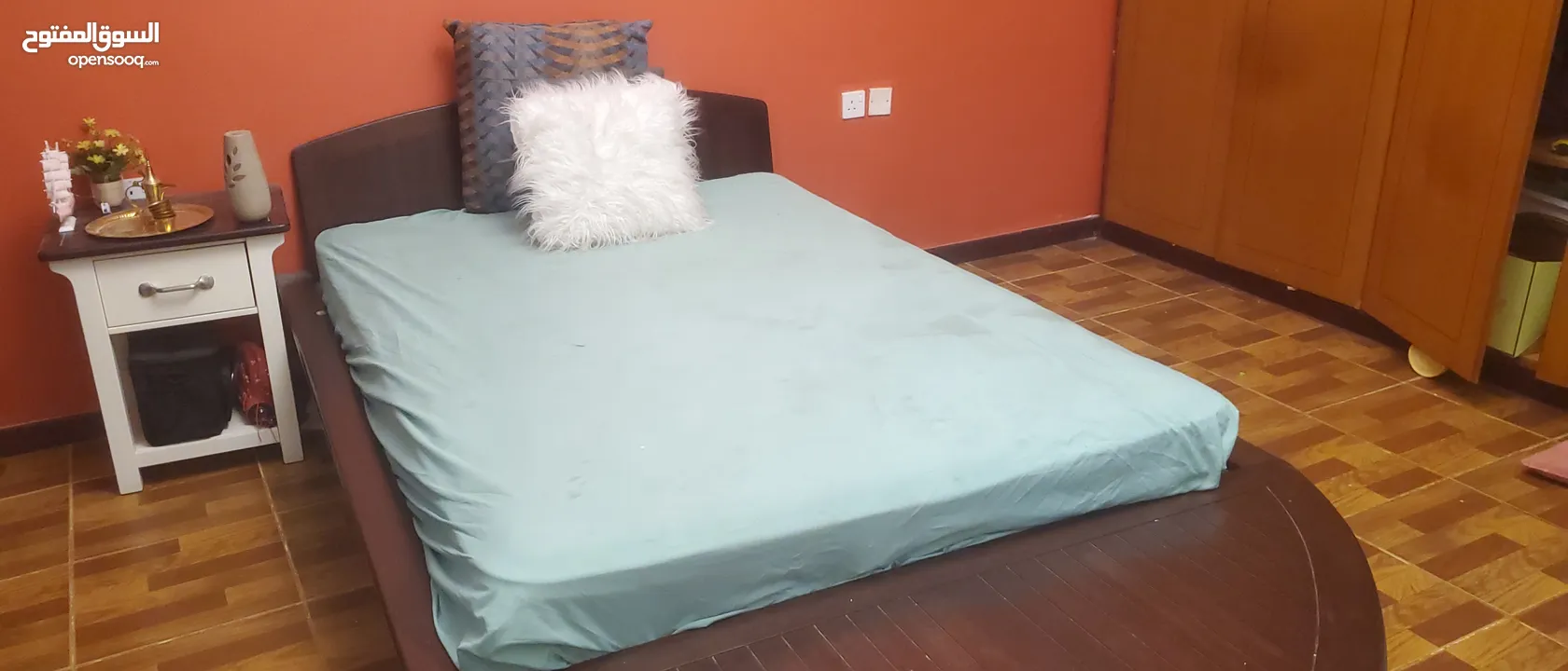 Bed with side table