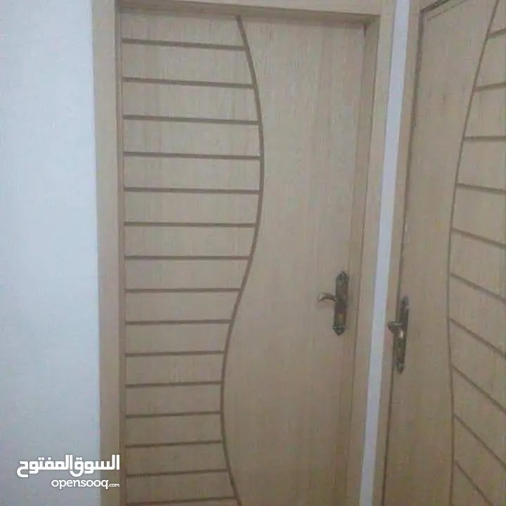 تفصيل كافة ابواب الخشب