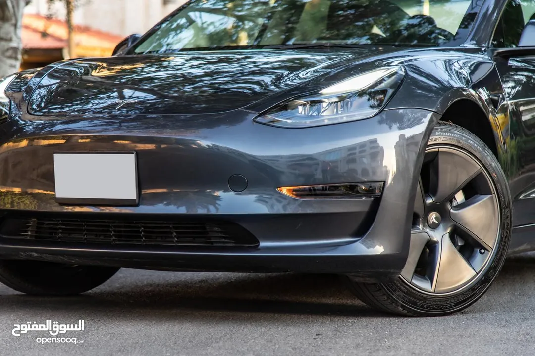 تيسلا model 3  tesla 2023 ستاندر  فحص كامل بحاله الوكاله  لون فيراني