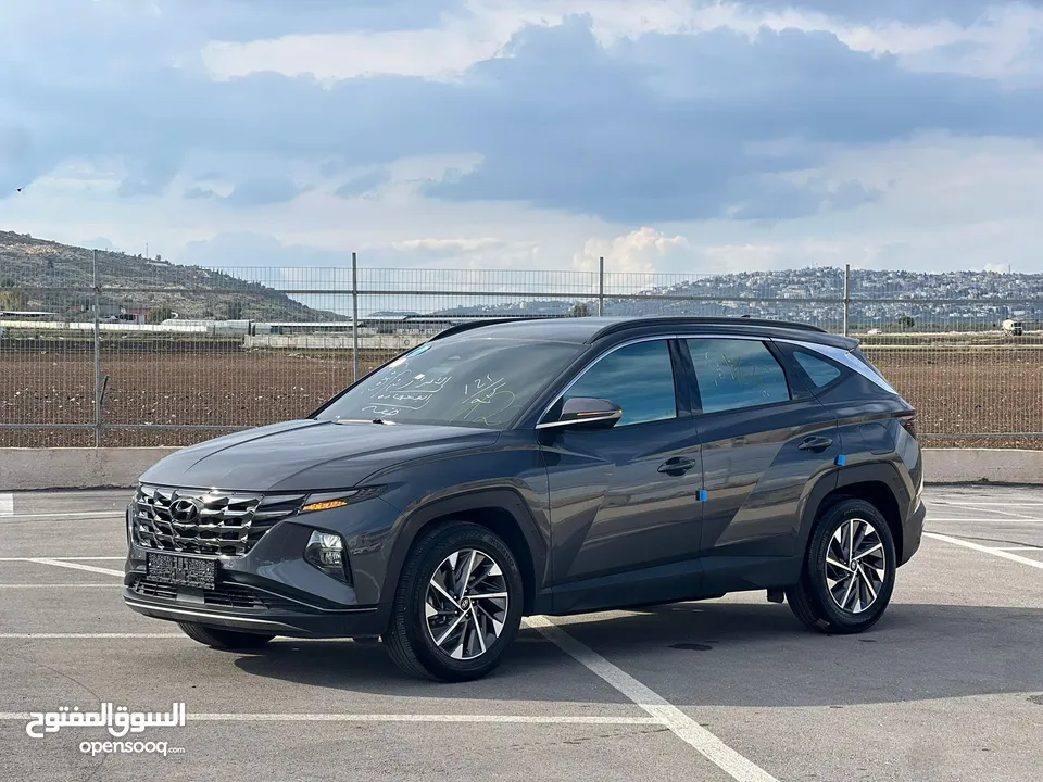 هونداي توسان/2022 فل الفل بدون فتحة سقف  2x4 ///240Hp بنزين + كهرباء  ( Haybrid) 1600cc