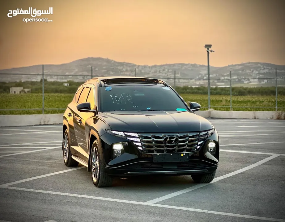 هونداي توسان/2022 فل الفل فتحة سقف بانوراما  2x4 ///240Hp بنزين + كهرباء  ( Haybrid) 1600cc