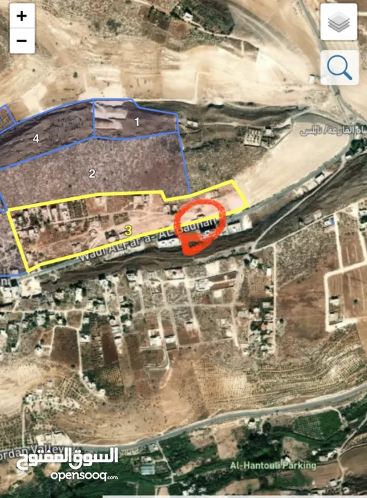 ارض تجارية ع الشارع العام بين الفارعة والباذان