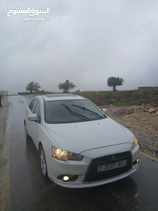 ميتسوبيشي لانسر. 2015 اصل برايفت رخصة وتامين ماطور 1600 اتومات شامل فتحة