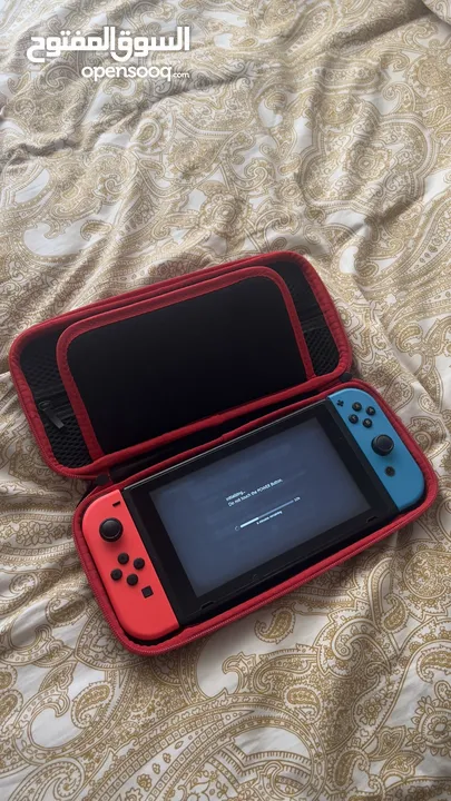 جهاز Nintendo switch استعمال بنت بحالة ممتازة مع pro controller واكسسوارات