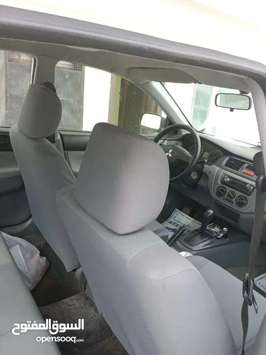 An automatic mitsubishi lancer 1.3 near and clean economical car