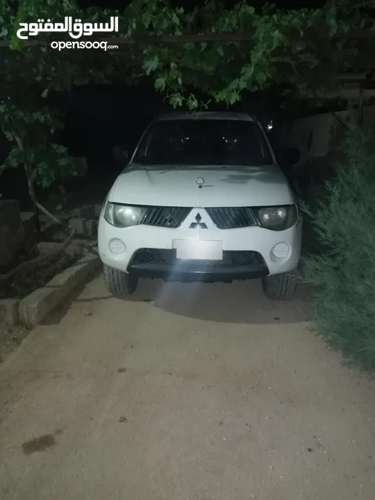 بك اب متسوبيشي   l200 موديل 2009 فور ويل 4X4