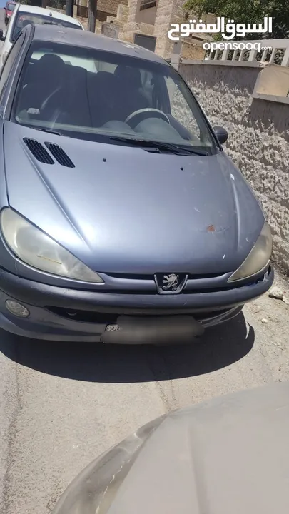 بيجو 2007 موديل 206 فحص كوم حديد 1300دينار